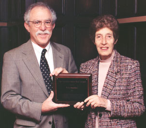 Eva Mueller receiving the Carolyn Shaw Bell Award on Jan. 6, 2001